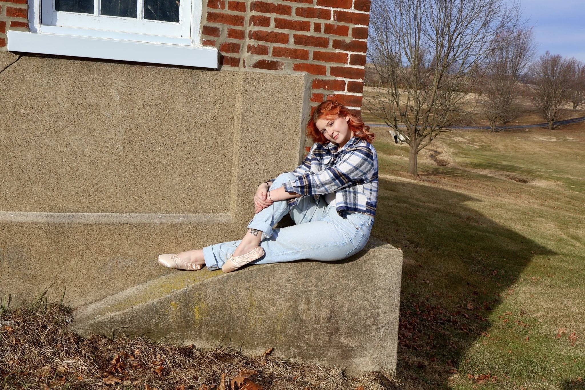 Outdoor portrait by a field